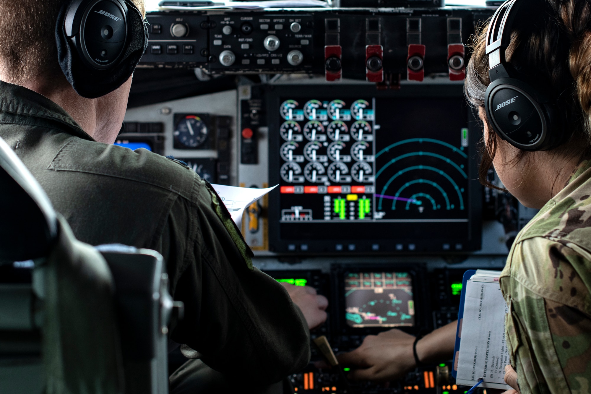 U.S. Air Force Capts. Kemper Peterson, left, and Crosby Shaver, 909th Air Refueling Squadron KC-135 Stratotanker pilots, conduct pre-flight checks at Kadena Air Base, Japan, Oct. 14, 2021. The 909th ARS is the premiere force for aerial refueling operations in the Indo-Pacific theater, supporting U.S. forces and regional allies and partners. (U.S. Air Force photo by Senior Airman Jessi Monte)