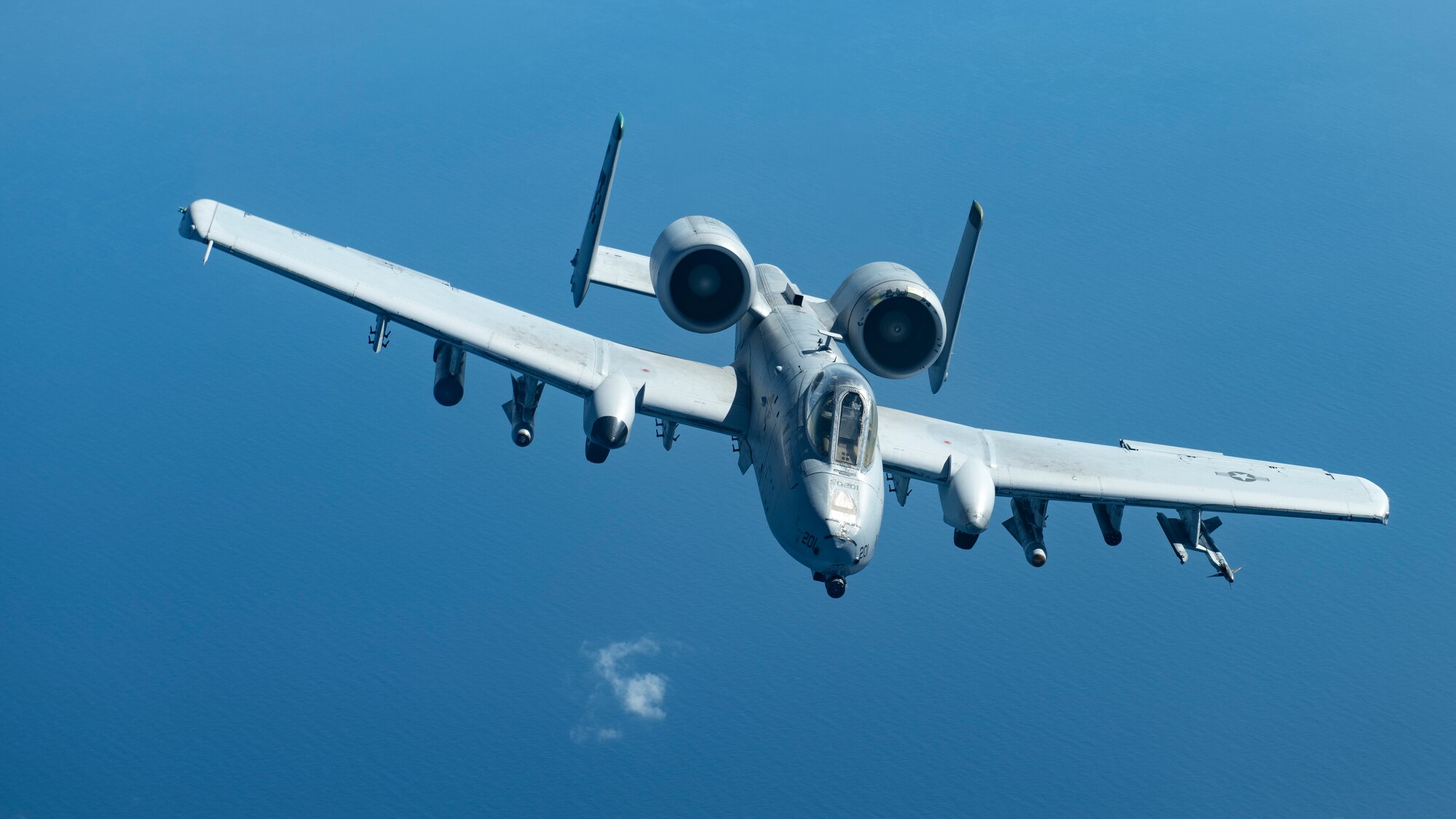 A U.S. Air Force A-10 Thunderbolt II assigned to the 51st Fighter Wing departs after receiving fuel over the Pacific Ocean Oct. 14, 2021. The 51st FW conducts routine training exercises to maintain the readiness needed to ensure the continued defense of Osan Air Base and the Republic of Korea. (U.S. Air Force photo by Senior Airman Jessi Monte)