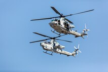 Aircraft assigned to Marine Light Attack Helicopter Squadron (HMLA) 167 perform during the 2021 Air Show at Marine Corps Air Station Cherry Point, North Carolina, Sept. 25, 2021.