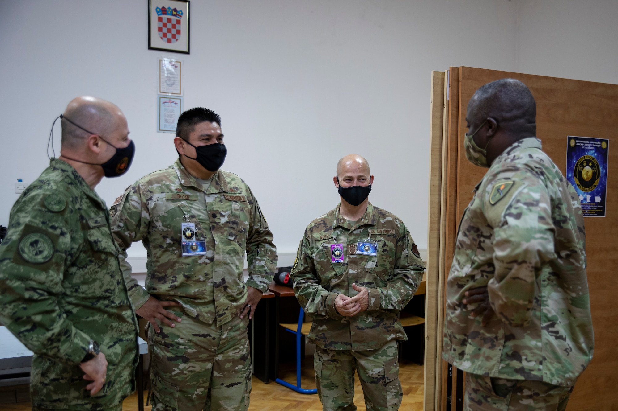Members of the 168th Cyberspace Operations Group talk with Army National Guard and Kosovo Security Forces members during Exercise Adriatic Thunder in Croatia, June 9, 2021. The 168th COS currently hosts members of the Defense Cyber Operations Element during drills. (U.S. Army National Guard photos by Sgt. Samantha Hircock)