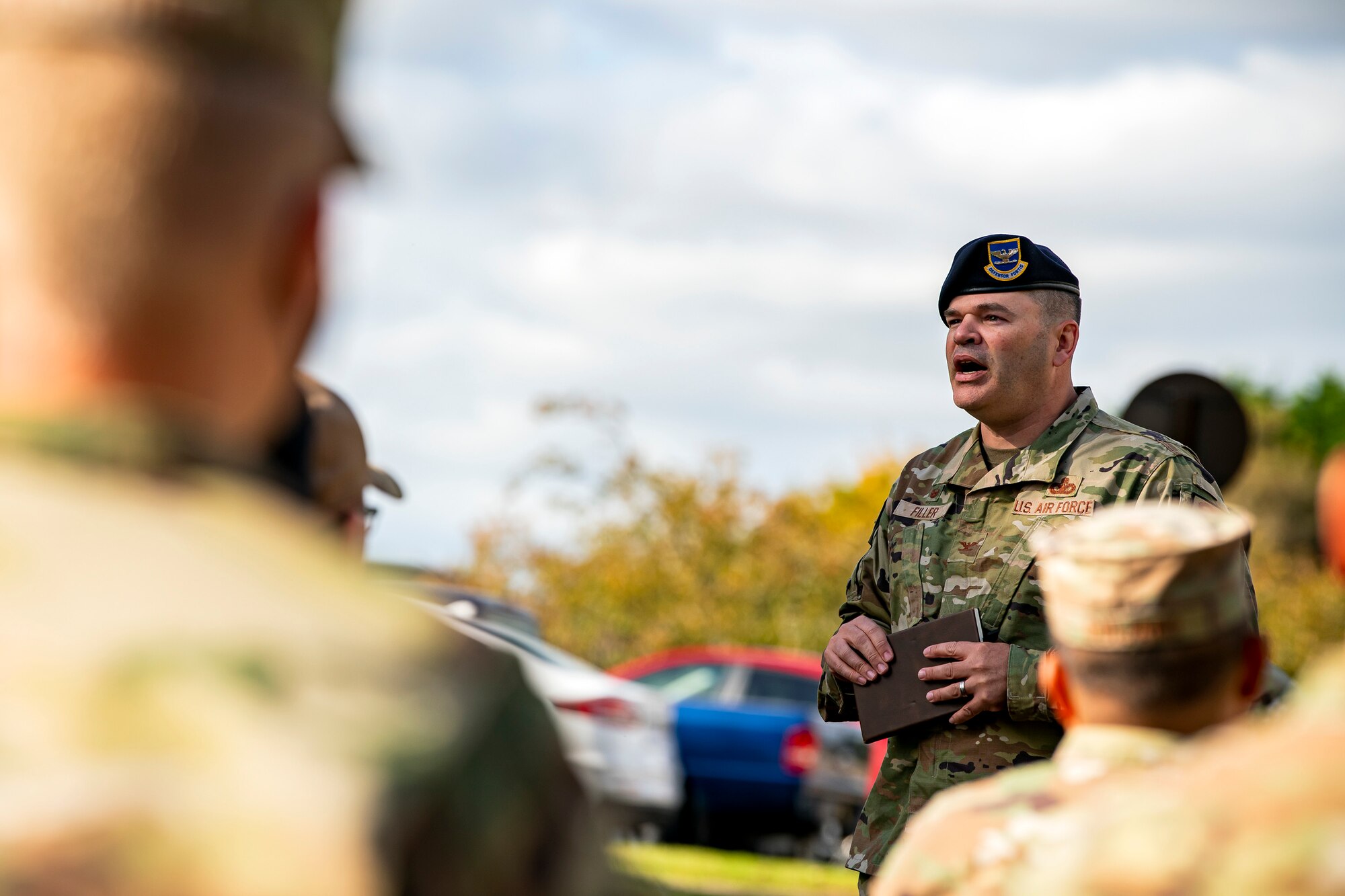 U.S. Air Force Col. Brian Filler, 501st Combat Support Wing commander, speaks during a retreat ceremony at RAF Croughton, England, Oct. 15, 2021. The ceremony concluded Police week in which defenders from the 422d and 423rd Security Forces Squadrons paid homage to those who lost their lives in the line of duty. (U.S. Air Force photo by Senior Airman Eugene Oliver)