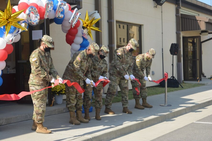 Dignitaries cut the ribbon, officially opening the Army Field Support Battalion-Korea SPT060 complex during the grand opening ceremony at Camp Humphreys, South Korea, Oct. 14.