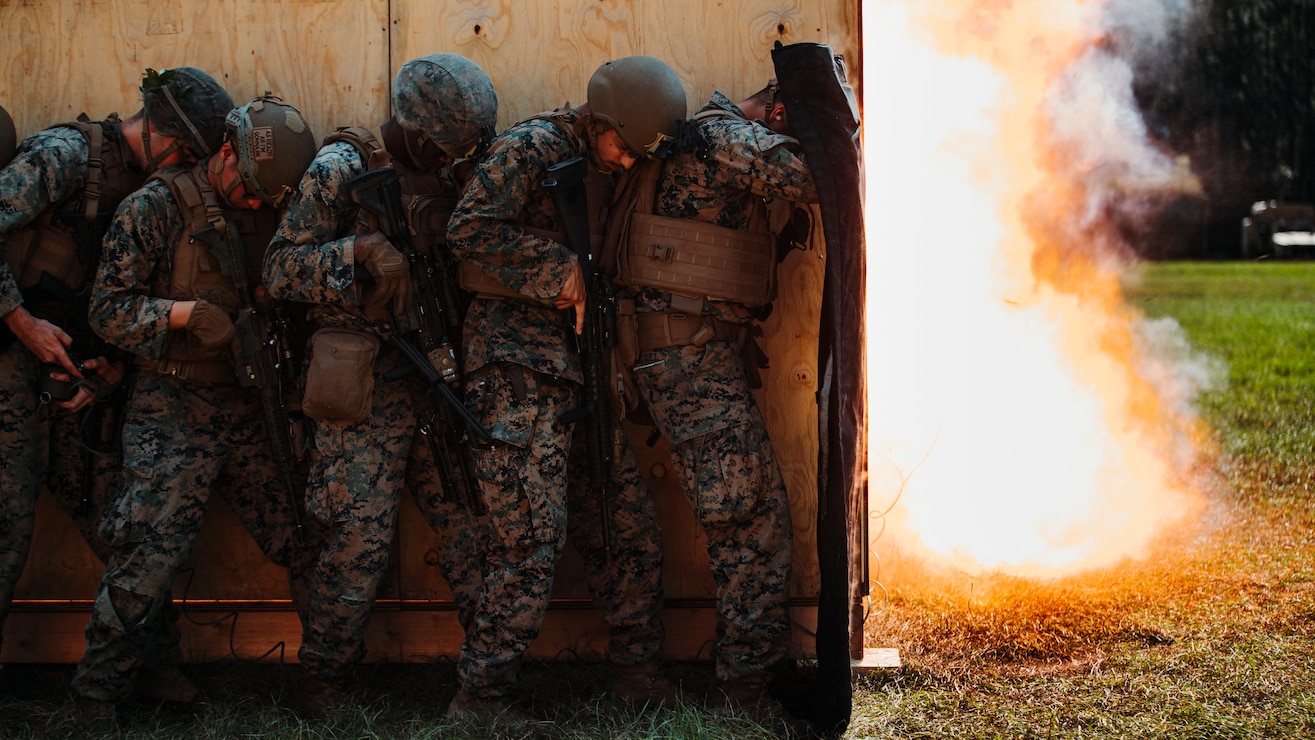 U.S. Marines with 2d Combat Engineer Battalion, 2d Marine Division, rehearse urban breaching techniques during the Sapper Leader’s Course 1-22 on Camp Lejeune, N.C., Oct. 16, 2021. The Sapper Leader’s Course gives students hands-on experience preparing explosives, breaching, clearing buildings, and working as a team through obstacles. (U.S. Marine Corps photo by Lance Cpl. Jacqueline C. Arre)