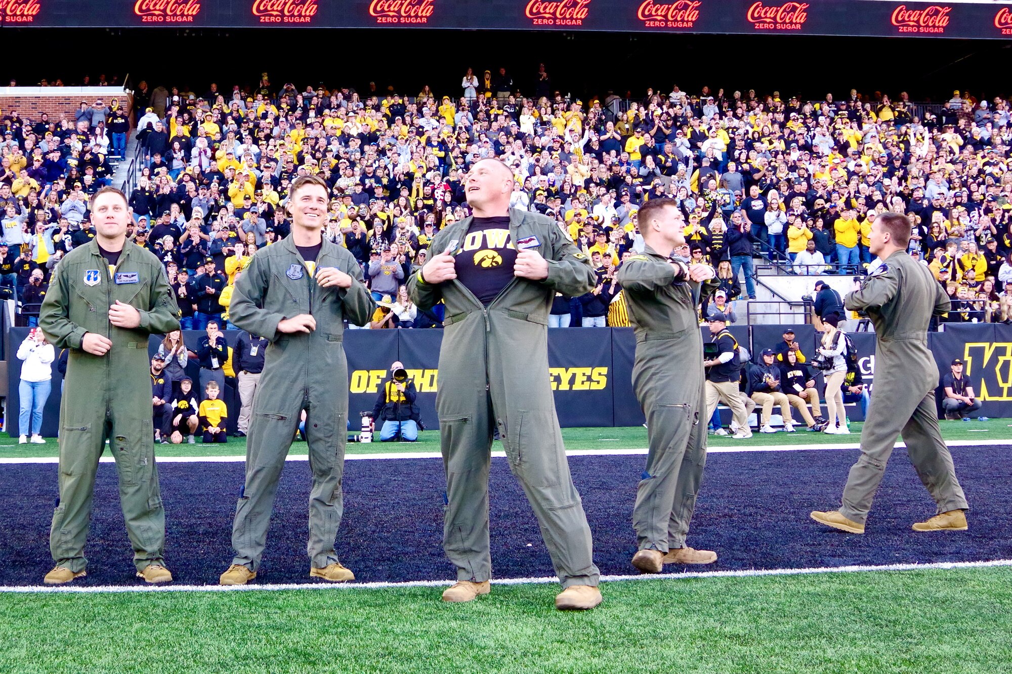 Aircrew from the 185th Air Refueling Wing are honored in the end zone at Kinnick Stadium in Iowa City, Iowa.