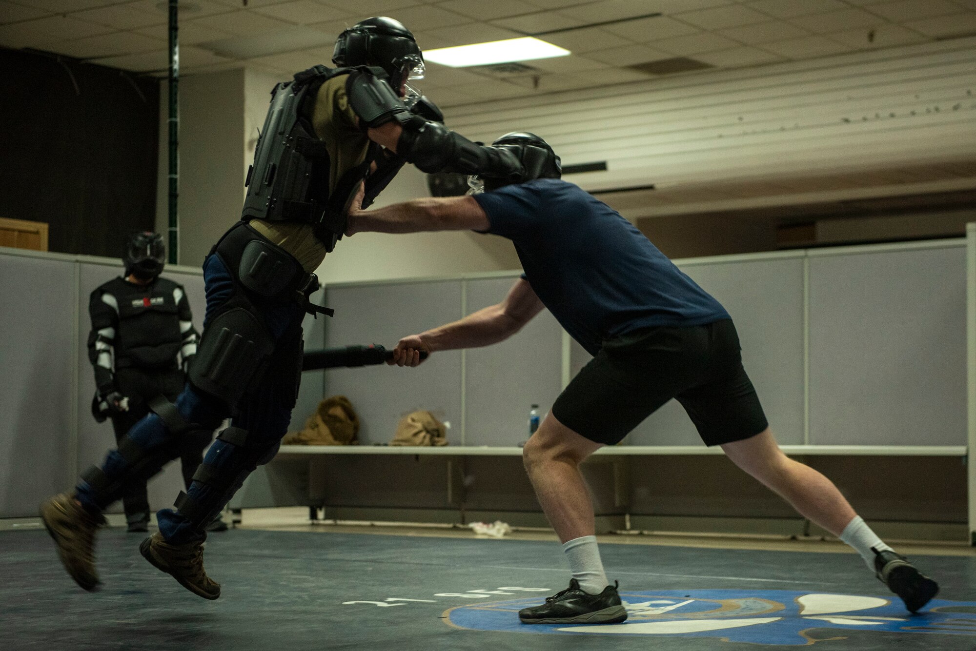 Security Forces Defenders and Firefighters participate in combatives.