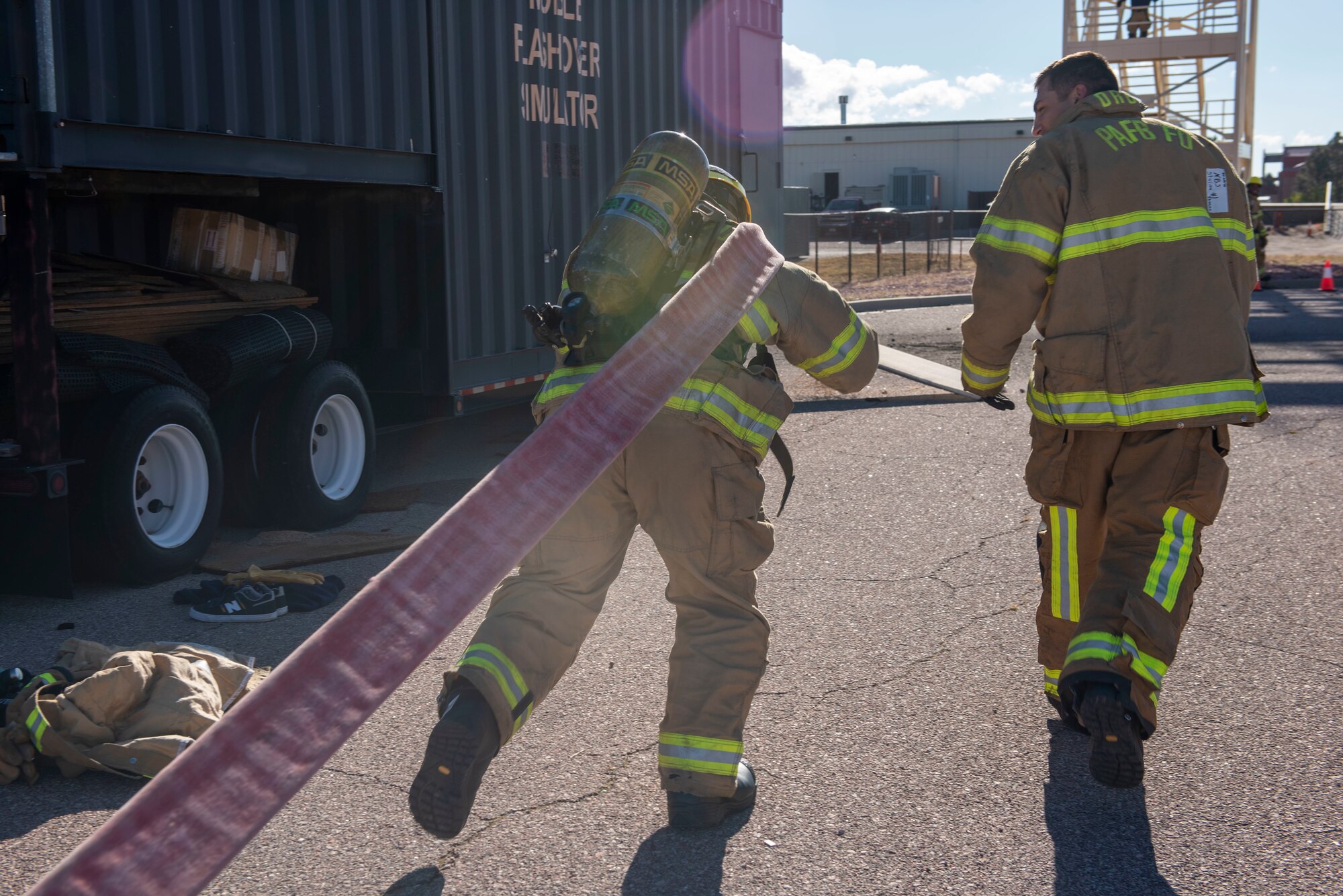 Firefighter participating in obstacle course