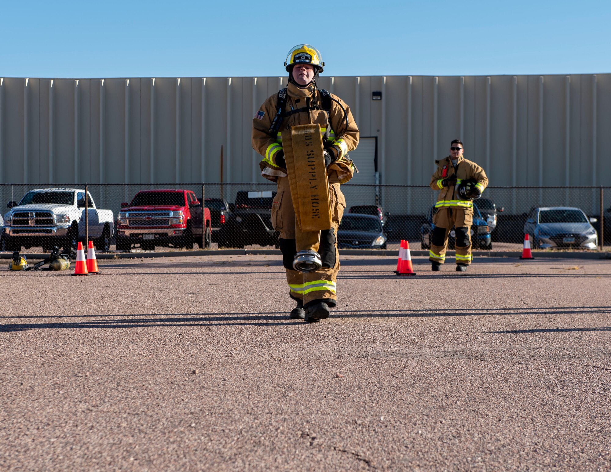Firefighter participating in obstacle course