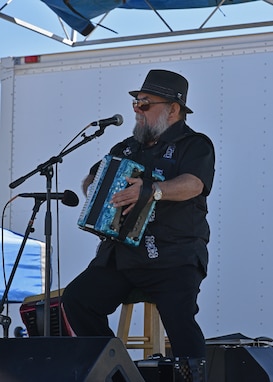 A local musician performs at the Oktoberfest at Goodfellow celebration at the Event Center Complex on Goodfellow Air Force Base, Texas, Oct. 16, 2021. Oktoberfest brought German culture to Goodfellow and allowed Airmen and their families to celebrate German heritage without travelling outside the local area. (U.S. Air Force photo by Senior Airman Ashley Thrash)