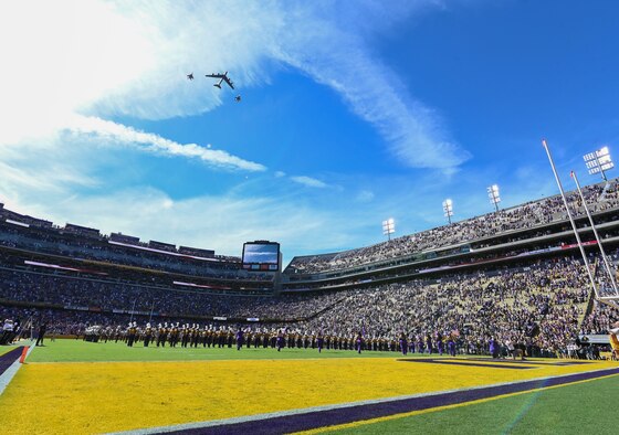 The aircraft flew over the stadium in conjunction with the singing of to the colors as a way to signal the start of the game.