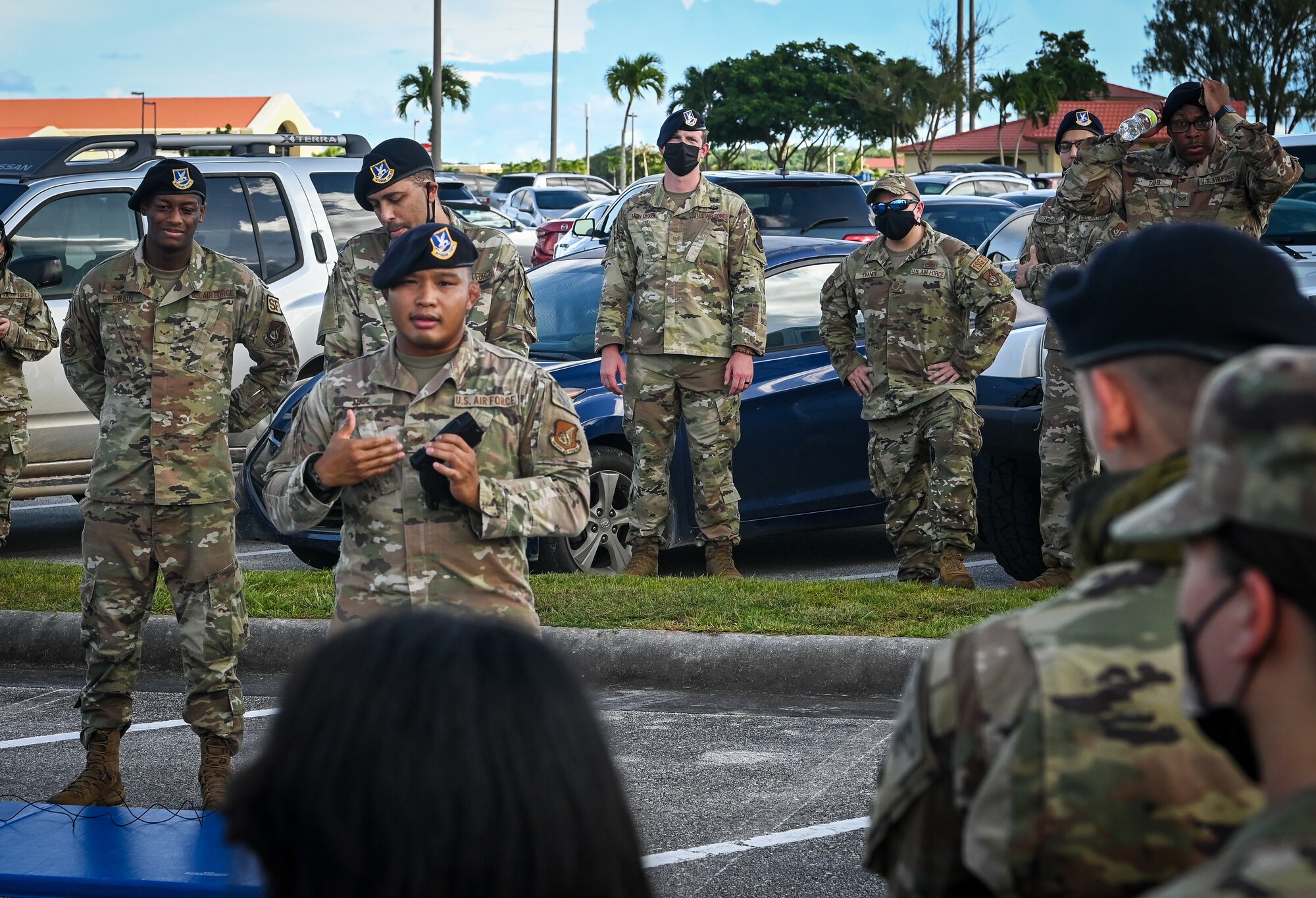 U.S. Air Force Staff Sgt. Channa Thol, patrolman assigned to the 36th Security Forces Squadron, briefs taser procedures at Andersen Air Force Base, Guam, Oct. 18, 2021.