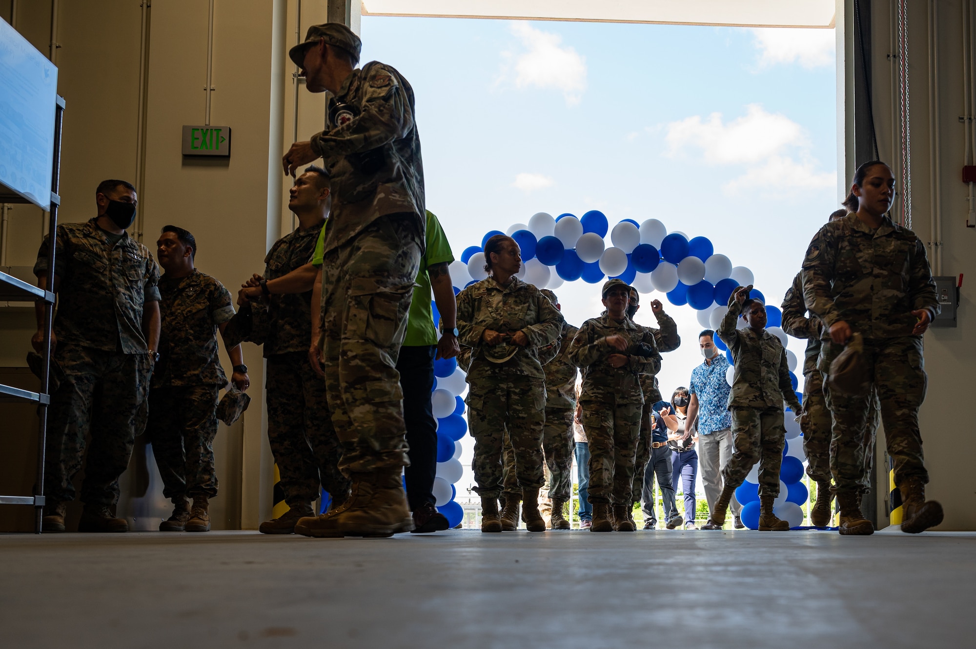 Airmen walk into new TLAMM-P building.