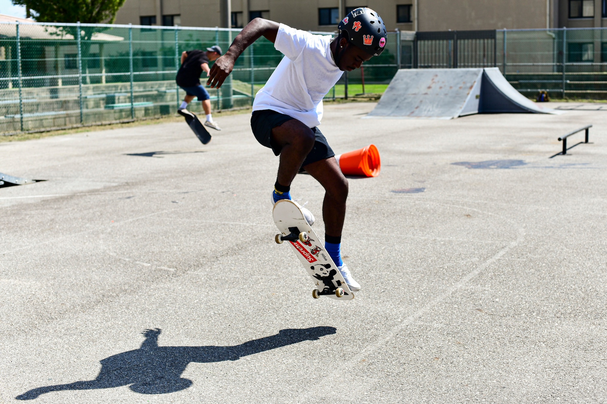 An Airman does an ollie.