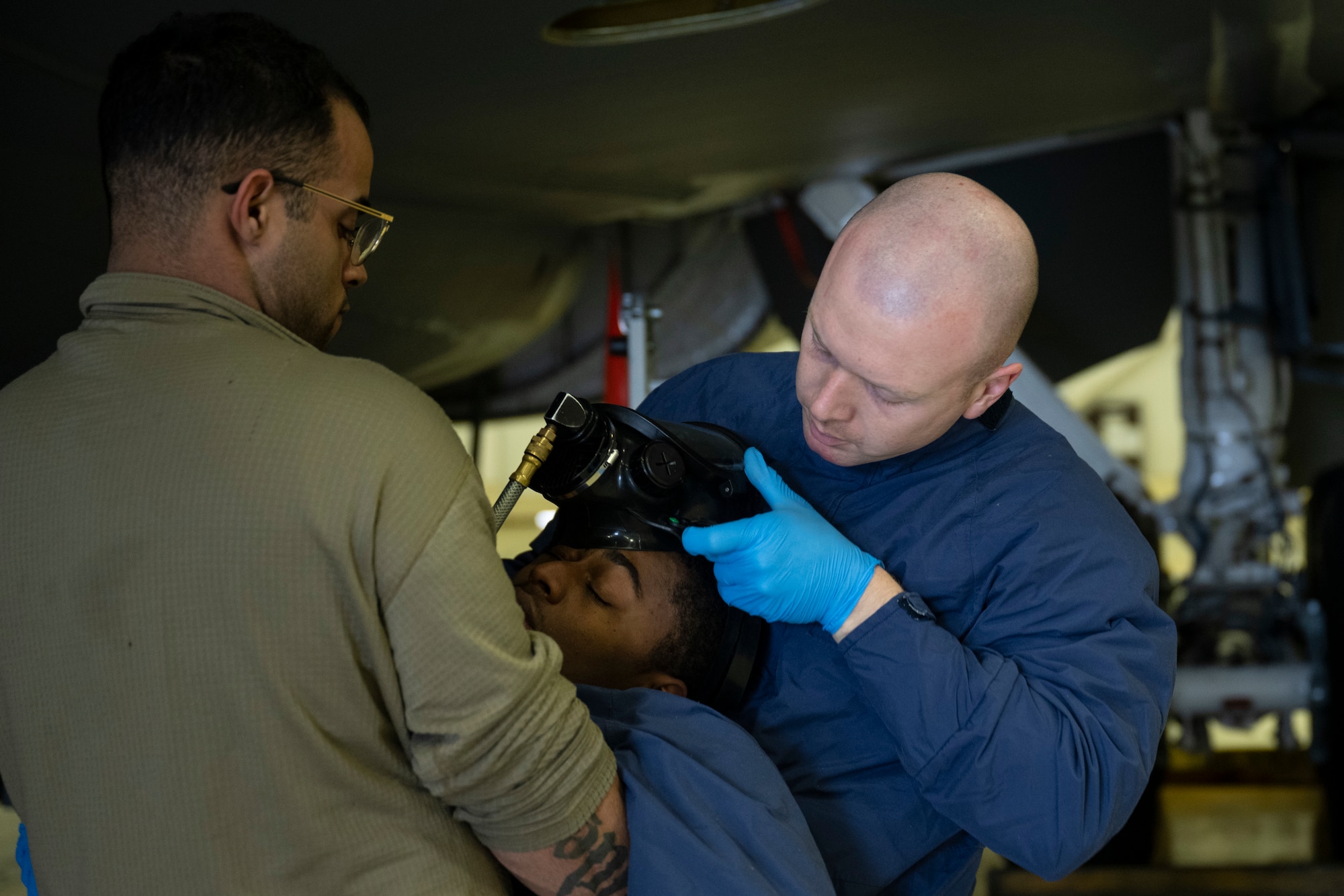 The 100th MXS practiced responding to an Airman losing consciousness inside of a fuel cell due to lack of oxygen while performing maintenance.