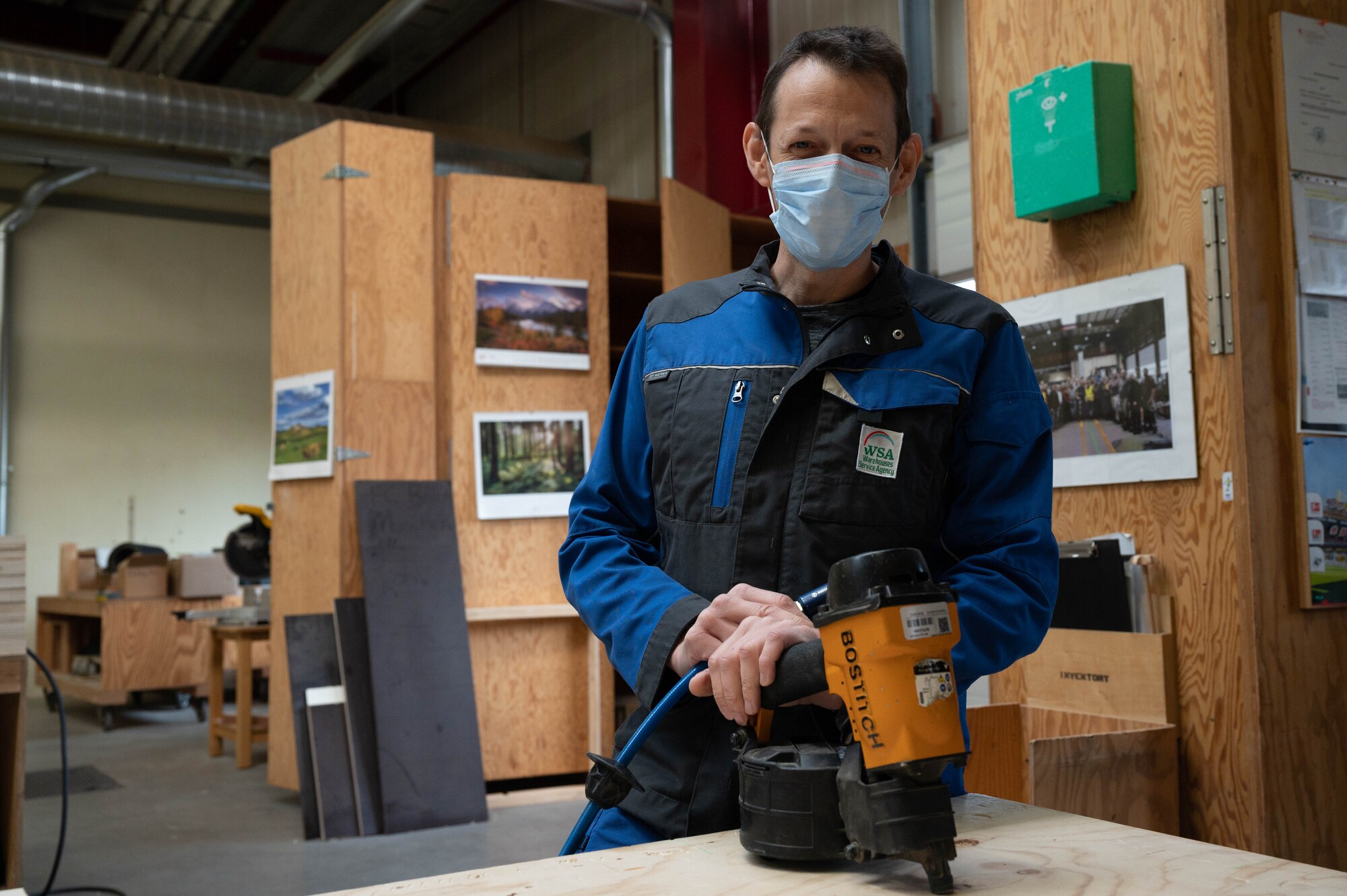 A Warehouses Service Agency carpenter poses for a photo.