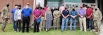 Group of masked men and women who participated in the DLA Indo-Pacific RDT Blue team exercise on the Korean Peninsula.