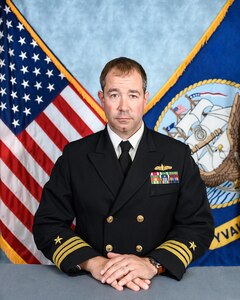 Cmdr. Justin M. Neff