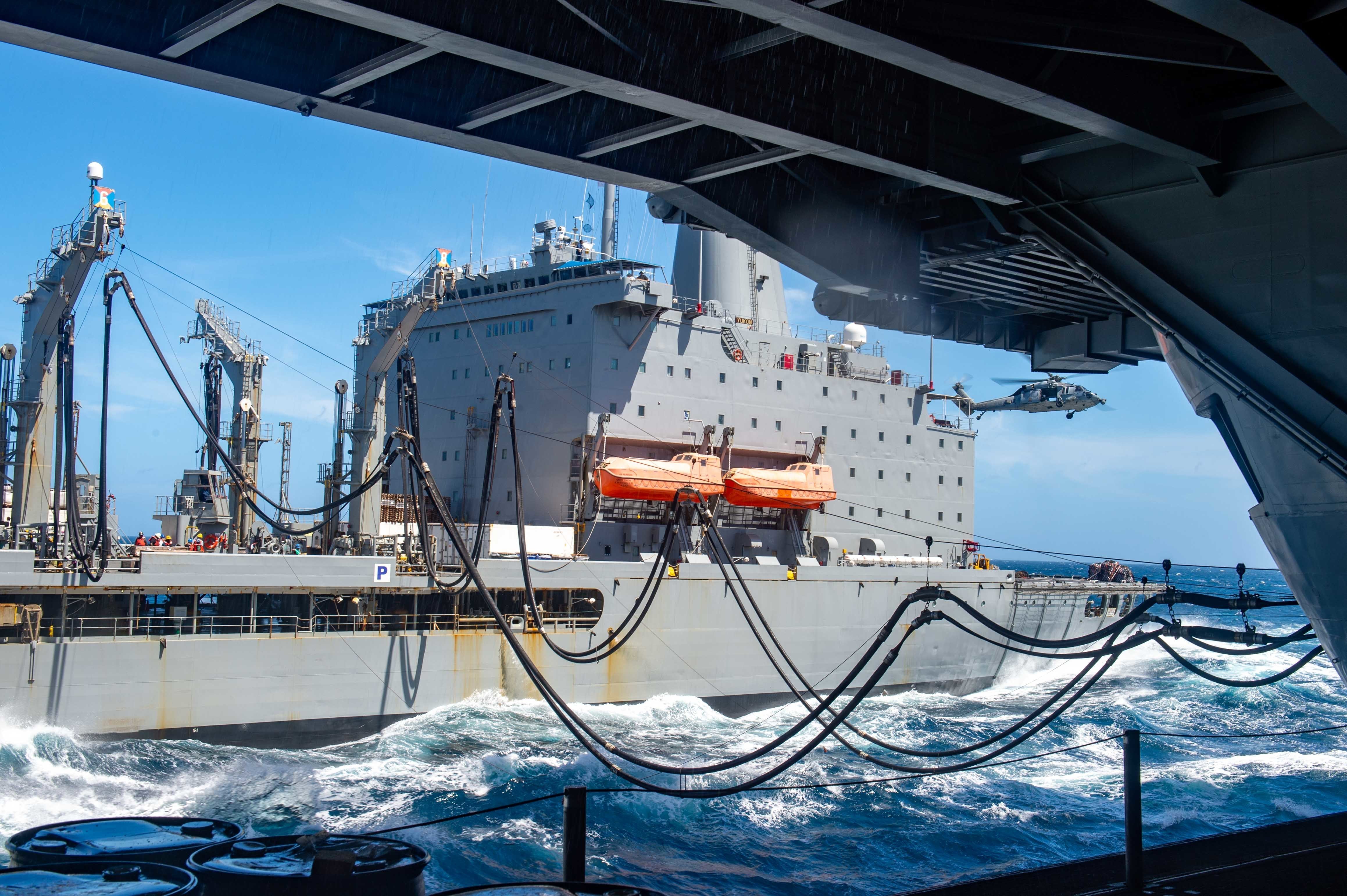 USS Carl Vinson (CVN 70) conducts a replenishment-at-sea with Henry J. Kaiser-class fleet replenishment oiler USNS Yukon (T-AO 202) during Maritime Partnership Exercise 2021, Oct. 18, 2021.