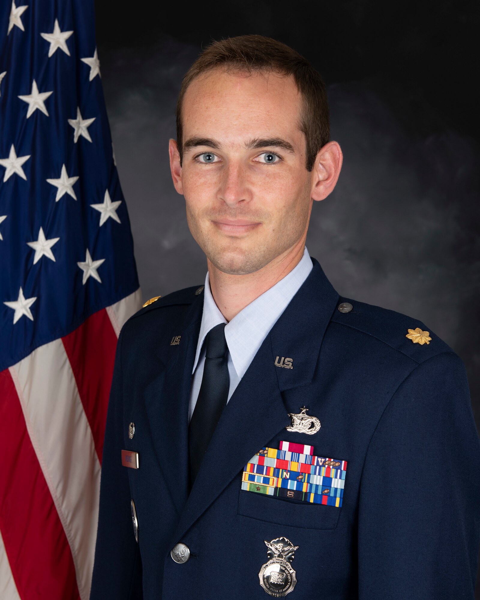 U.S. Air Force Maj. Daniel Merkh, 423rd Security Forces Squadron commander, poses for an official photo at Royal Air Force Alconbury, England, July 21, 2021. (U.S. Air Force photo by Senior Airman Jennifer Zima)