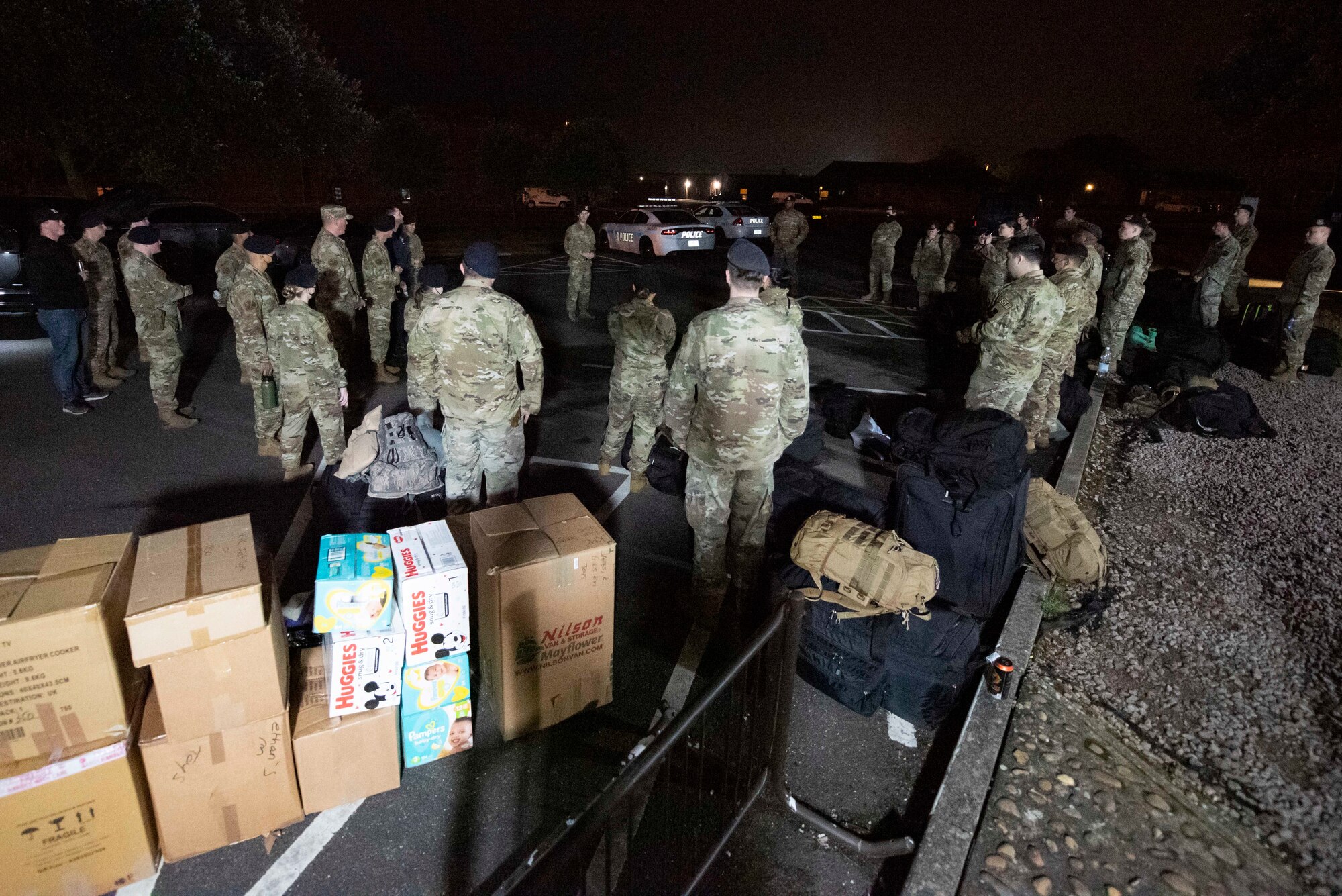 U.S. Air Force 501st Combat Support Wing security forces defenders prepare to deploy from Royal Air Force Mildenhall, England, to Ramstein Air Base to provide security as part of Operation Allies Refugee, Aug. 23, 2021. Ramstein Air Base is providing safe, temporary lodging for evacuees from Afghanistan as part of Operation Allies Refuge during the next several weeks. Operation Allies Refuge is facilitating the quick, safe evacuation of U.S. citizens, Special Immigrant Visa applicants and other at-risk Afghans from Afghanistan. Evacuees will receive support, such as temporary lodging, food, medical screening and treatment and more, while housed at Ramstein Air Base while preparing for onward movements to their final destinations. (U.S. Air Force photo by Senior Airman Jennifer Zima)