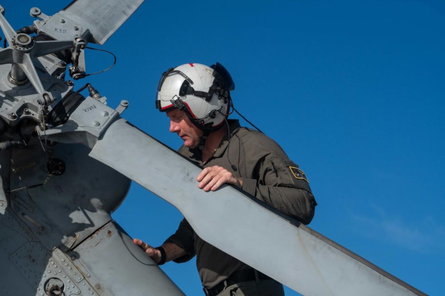 HSC-23 Sailor Conducts Pre-flight Check