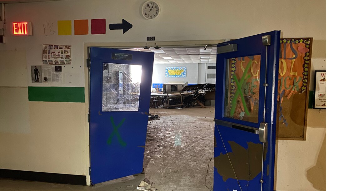 Doors into Waverly Elementary School Auditorium were damaged from water pressure.