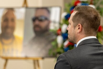 Ben Sauro reflects on the life of his brother, Michael G. Sauro, a former Defense Ammunition Center hazardous material instructor who lost his life while deployed as a civilian in support of Operation Freedom’s Sentinel, during a building dedication ceremony at Camp Atterbury, Ind., June 3, 2021. Sauro was one of four Army civilian employees who lost their lives in service to their country while deployed and had buildings on the installation named after them during the day’s events. (U.S. Army photo by Mark R. W Orders-Woempner)