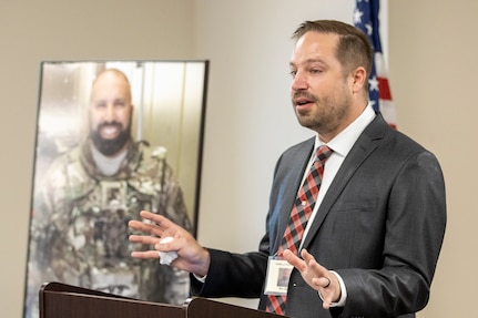 Ben Sauro reflects on the life of his brother, Michael G. Sauro, a former Defense Ammunition Center hazardous material instructor who lost his life while deployed as a civilian in support of Operation Freedom’s Sentinel, during a building dedication ceremony at Camp Atterbury, Ind., June 3, 2021. Sauro was one of four Army civilian employees who lost their lives in service to their country while deployed and had buildings on the installation named after them during the day’s events. (U.S. Army photo by Mark R. W Orders-Woempner)