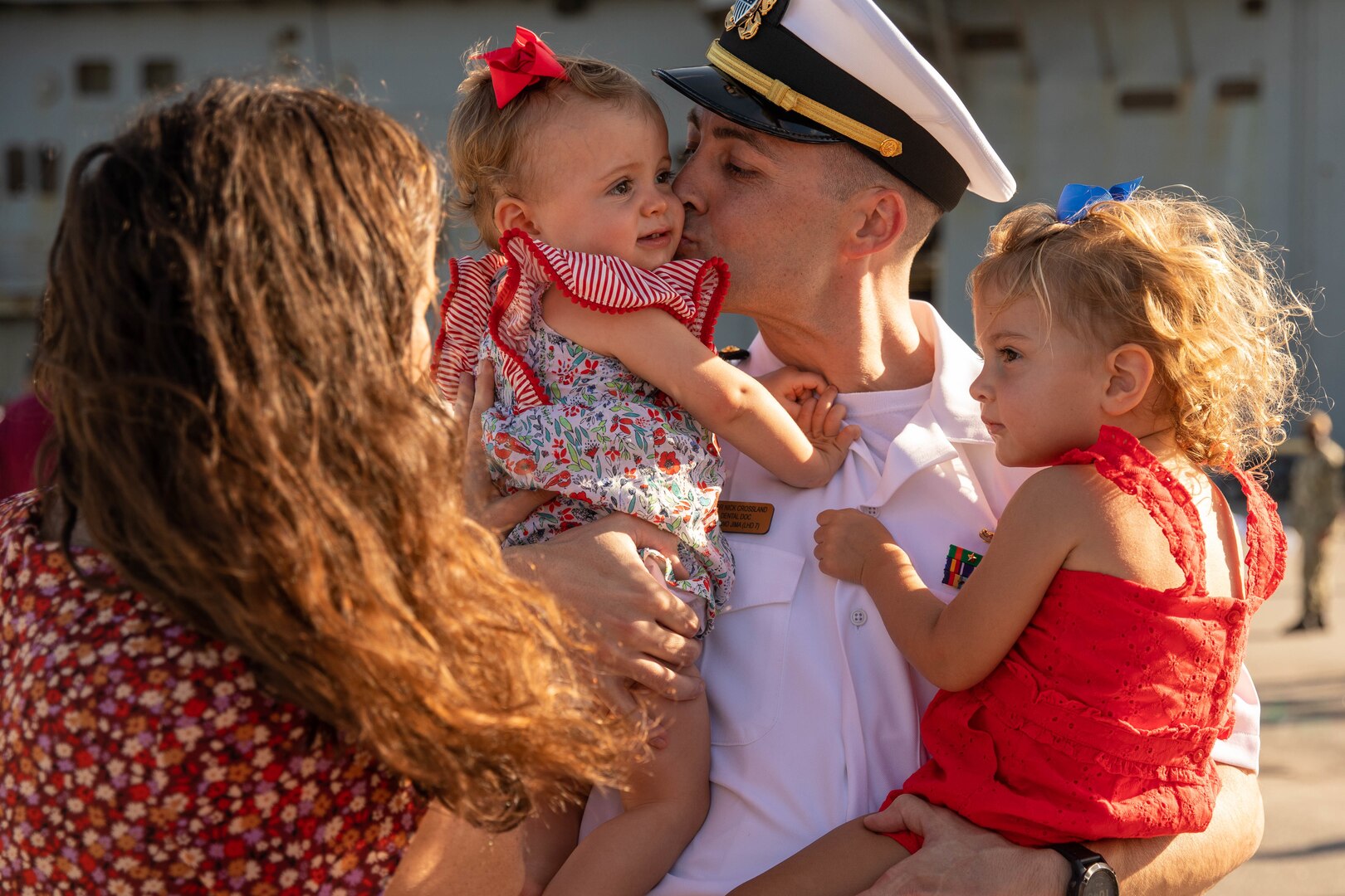 Service member greets family