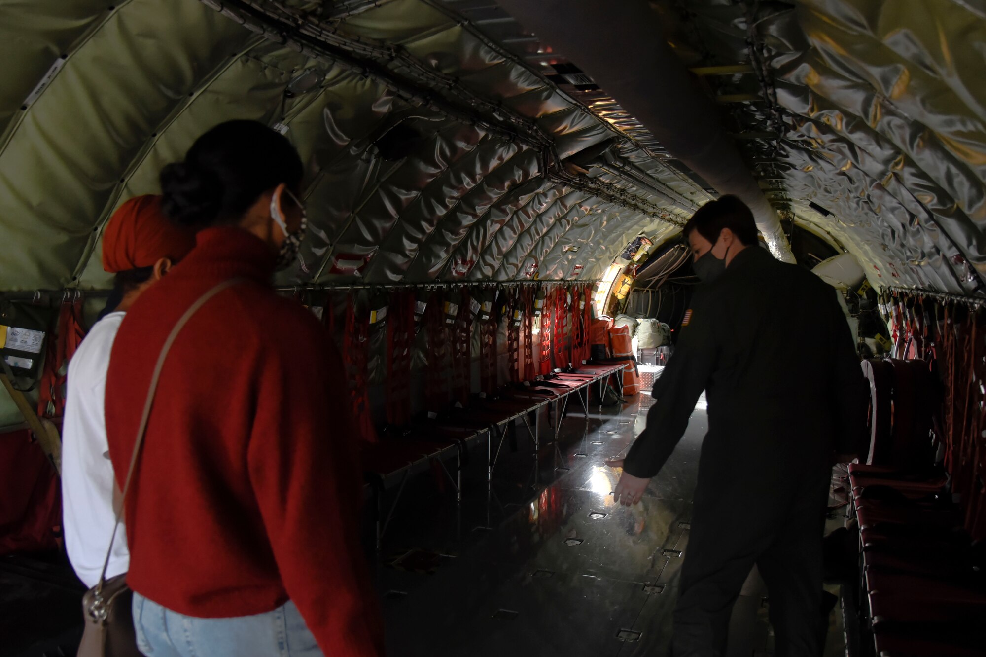 U.S. Air Force Master Sgt. Lauren Powell, 93rd Air Refueling Squadron boom operator, gives a tour of a KC-135 Stratotanker during “The Sky’s No Limit: Girls Fly Too” event in Abbotsford, Canada, Oct. 2, 2021. The event gave Airmen from Fairchild an opportunity to empower young ladies, and inspire them to pursue various career opportunities. (U.S. Air Force photo by 2nd Lt. Michelle Chang)
