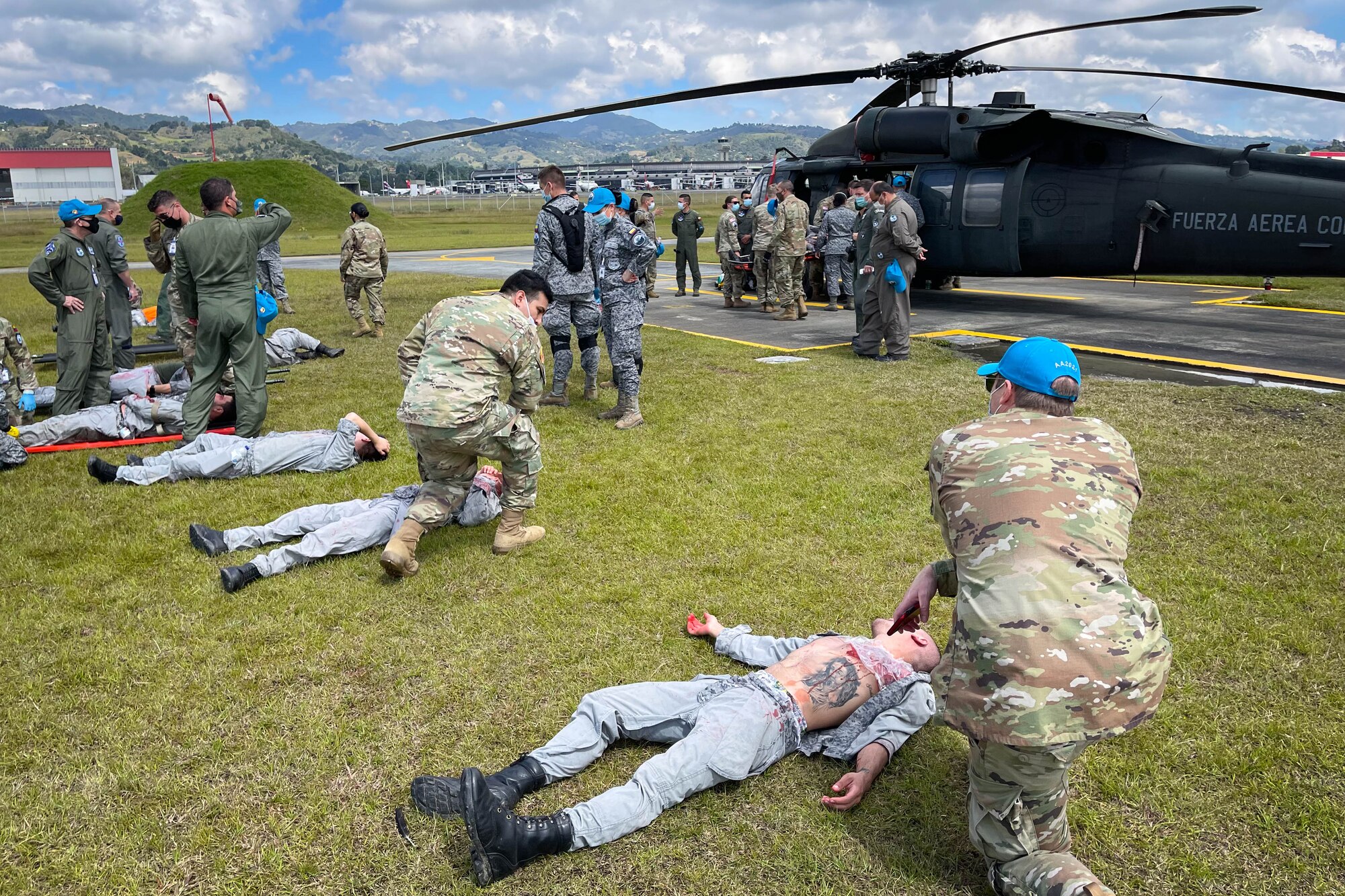 Rionegro, Colombia - U.S. Air Force Airmen and Airmen from several partner countries’ Air Forces conduct simulated medical training during exercise Angel de los Andes at Jose Maria Cordova International Airport in Colombia, Sept. 3, 2021. Reserve Citizen Airman Lt. Col. Heleno Souza, 944th Aeromedical Staging Squadron chief administrator, participated in this two-week multinational, Colombian led exercise Aug. 30-Sept 10 that focused on international search and rescue, humanitarian assistance, disaster relief, and aerial evacuation. (Courtesy photo by Lt. Col. Souza)