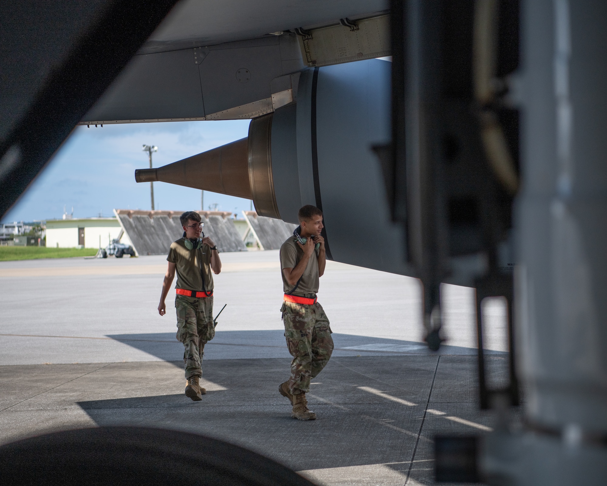An Airman talks on a headset.