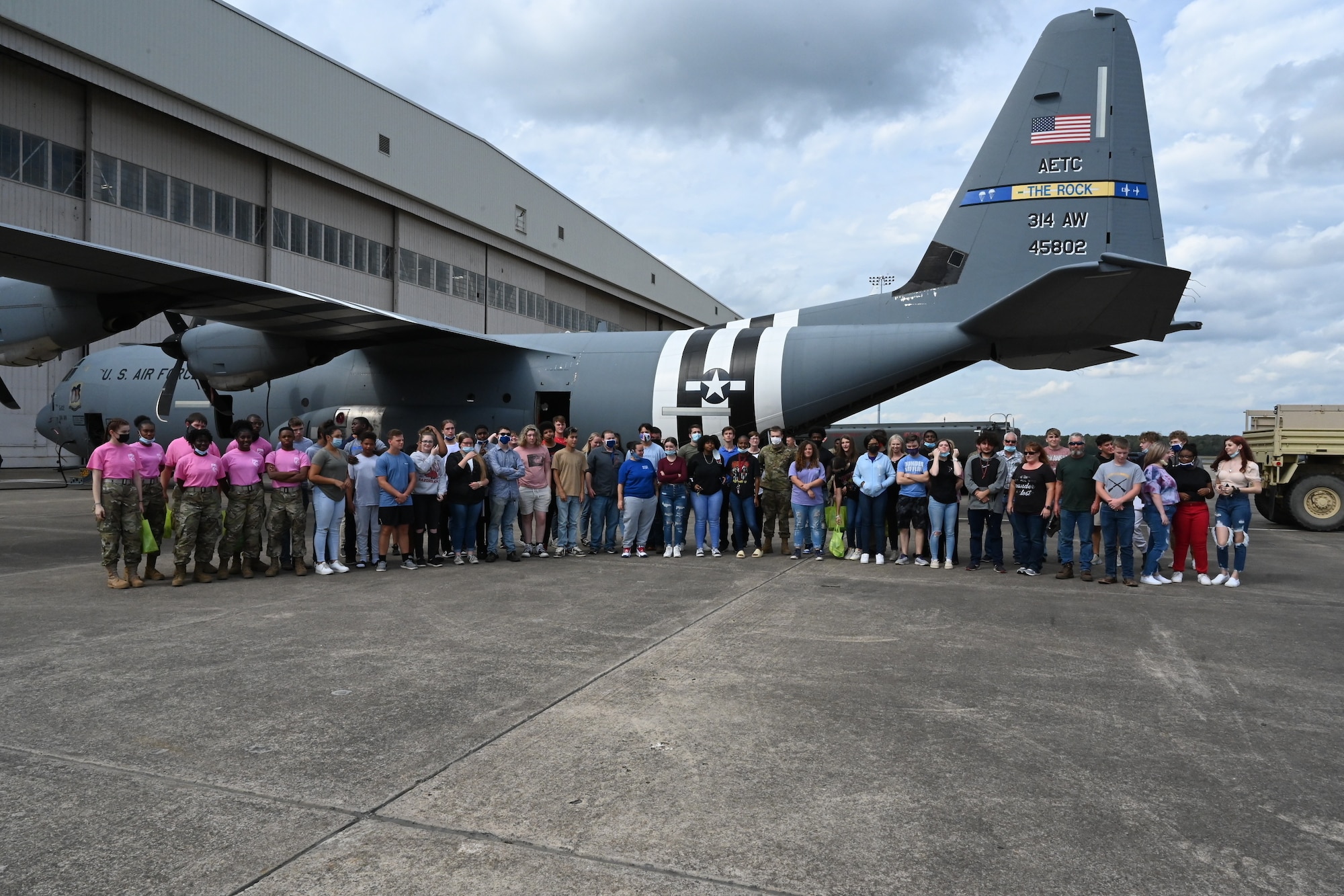 A group of people pose for a photo