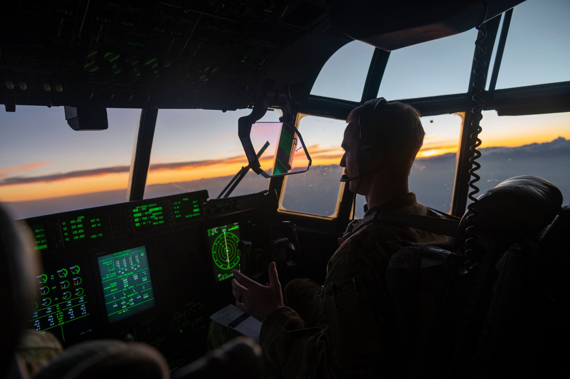 A pilot flies a C-130J