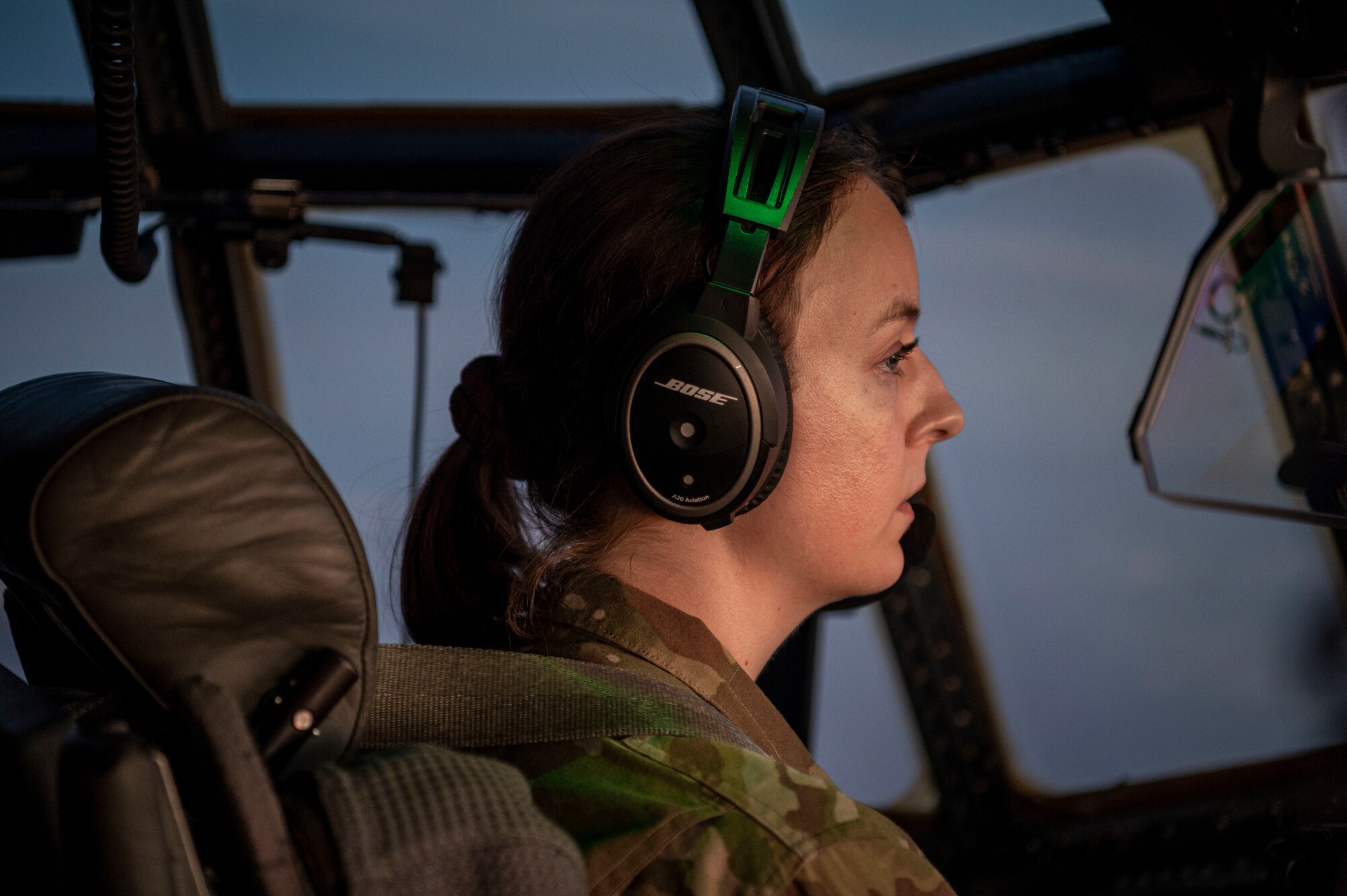A pilot flies a C-130J