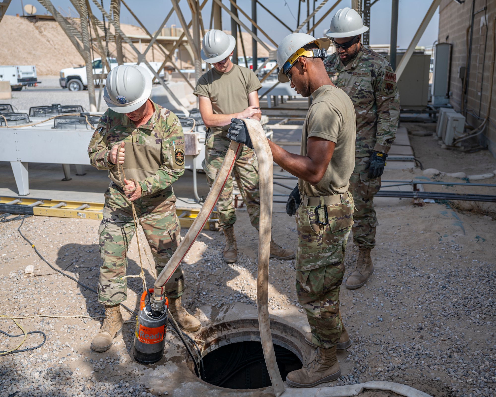 Members of the U.S. Air Forces Central, Air Force Forces A67 Engineering and Installation team assist in checking communication lines at Ali Al Salem Air Base, Kuwait, Oct. 19, 2021.
