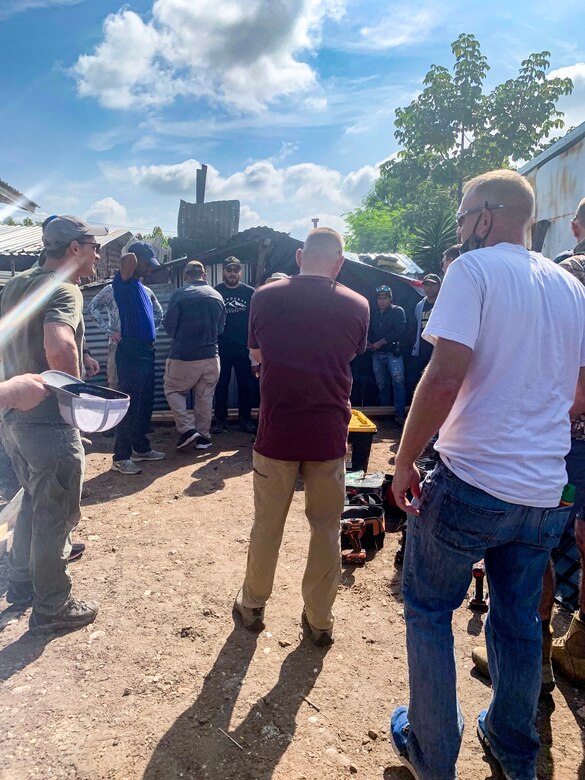 Service members and volunteers from Joint Task Force Bravo (JTF-B), Soto Cano Air Base, help construct a house for a local family in La Paz, Honduras, Oct. 17, 2021.