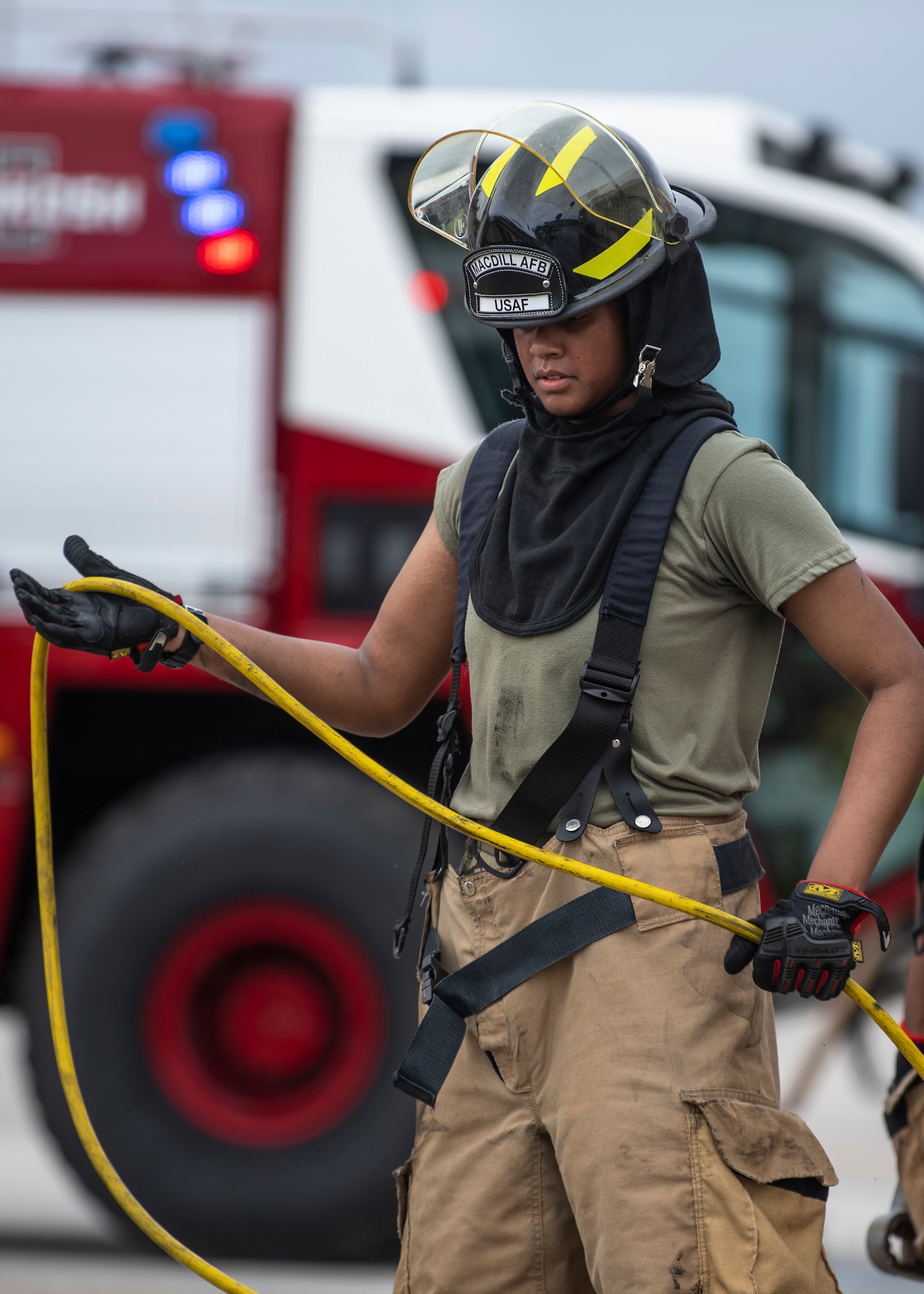A fire protection specialist with the 6th Civil Engineer Squadron Fire Emergency Services Flight responds to a fire at MacDill Air Force Base, Florida, Sept. 20, 2021.