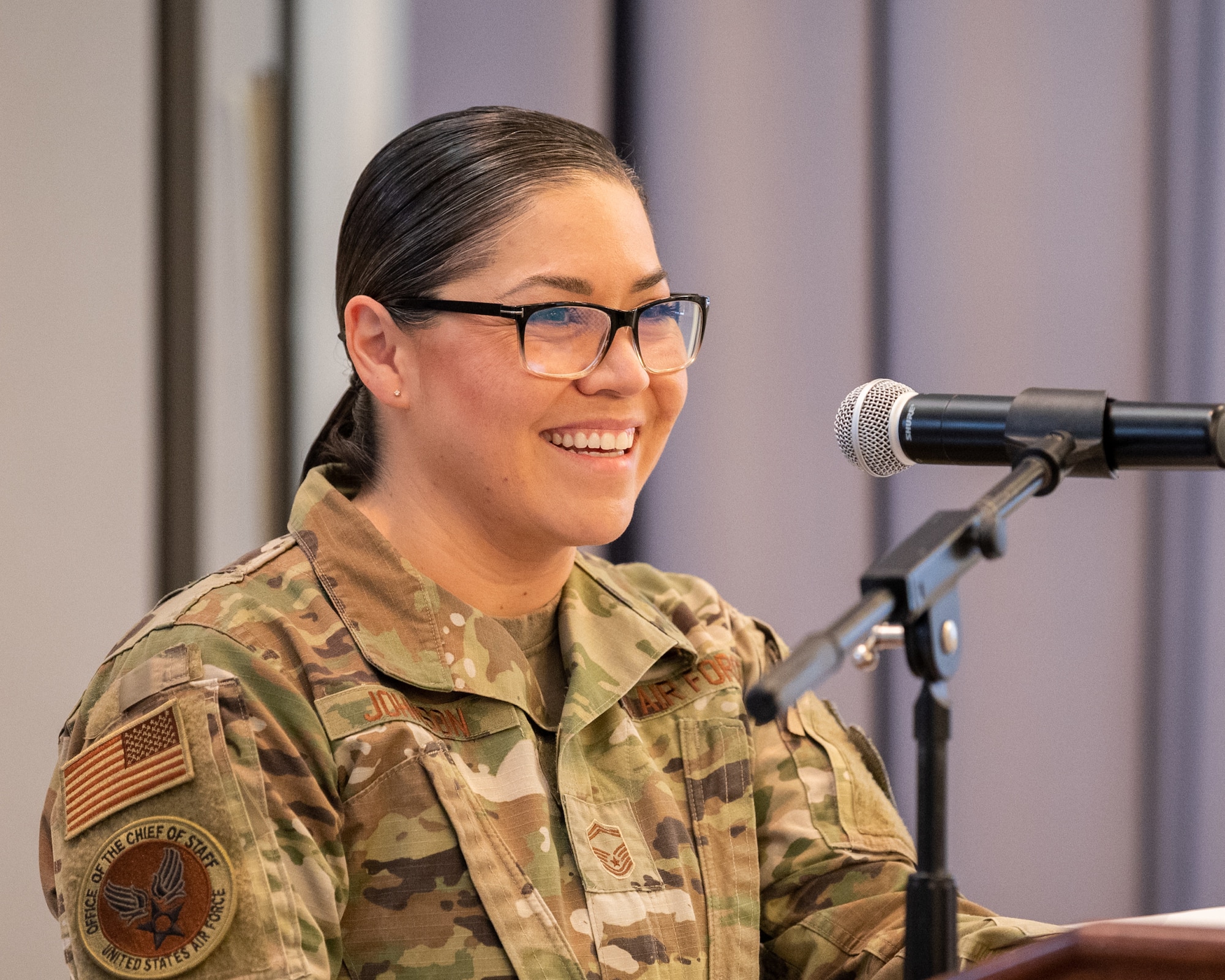 Senior Master Sgt. Christian Johnson, Air Force Chief of Staff superintendent, speaks during the Hispanic Heritage Month Luncheon at Dover Air Force Base, Delaware, Oct. 15, 2021. During her speech, Johnson spoke about breaking traditional gender roles within her Mexican culture by joining the military and opened up about some of the challenges she faced as an immigrant in the armed forces. (U.S. Air Force photo by Mauricio Campino)