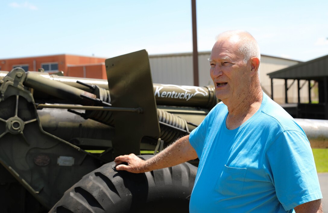 Retired Lt. Col. Dick Stoops describes an M114A2 Howitzer on Boone National Guard Center in Frankfort, Ky on May 10, 2021.  Stoops restored the decommissioned gun during the summer of 2021 (U.S. Army photo by U.S. Army Sgt. Jesse Elbouab).