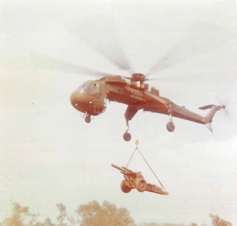 CH-54 Flying Crane "hooking out" a Howizter from Alpha Battery, 2/11th Field Artillery Brigade from Firebase Spear to Firebase Fury, Vietnam in March 1969 (Photo courtesy of Retired Lt. Col. Dick Stoops).