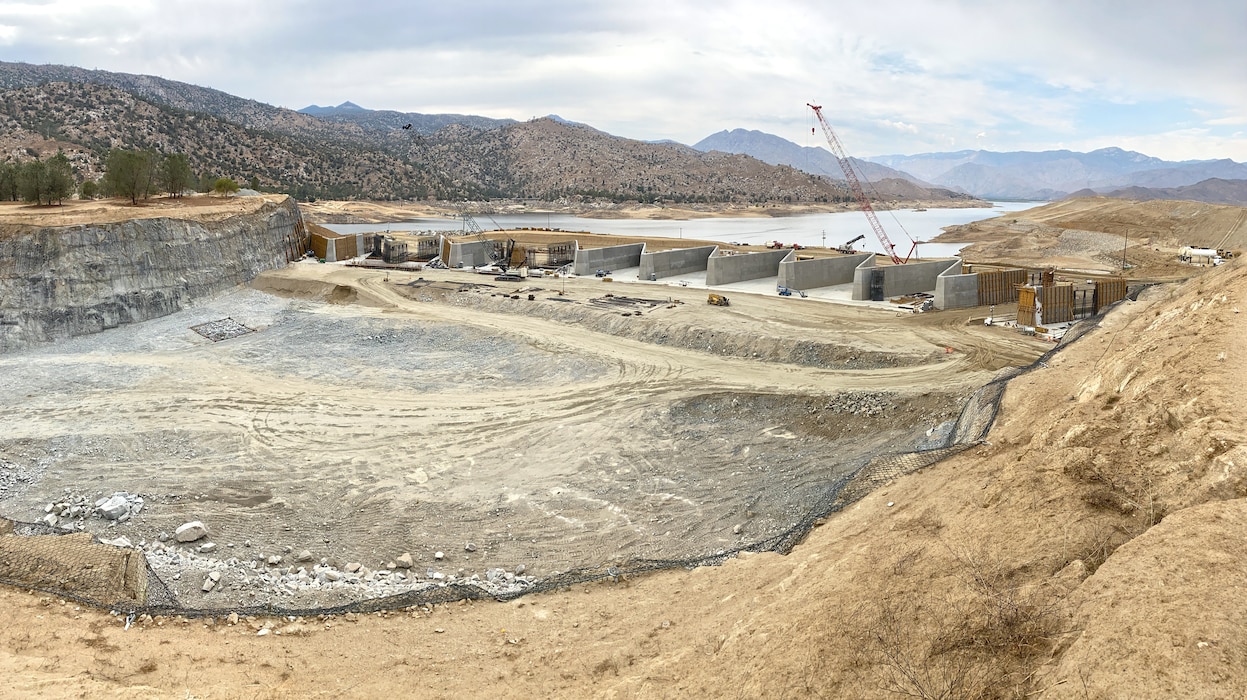 Isabella Reservoir is located forty miles northeast of Bakersfield, Kern County, California, and consists of an earthfill main dam and auxiliary dam across Kern River and Hot Springs Valley, respectively. The dam was authorized under the Flood Control Act of 1944 and construction was completed in 1953. The reservoir provides flood-risk management, irrigation and recreational benefits. With more than 300,000 people living and working below the dams, primarily in the town of Lake Isabella and the city of Bakersfield, the U.S. Army Corps of Engineers began a dam safety modification study in 2006 to address seismic, hydrologic (potential over-topping during an extreme flood event) and seepage issues at the dams.

An operating restriction is currently in place, limiting the lake’s normal storage capacity and reducing the risk of the seepage and seismic concerns while a permanent solution is implemented. USACE has increased surveillance and monitoring; stockpiling of emergency materials; warning sirens in the town of Lake Isabella; installation of additional instrumentation for monitoring; and continued public outreach with Kern County and the local public.

Following the signing of the Record of Decision in December 2012, the Corps entered the Pre-Construction Engineering and Design phase of the project, and from 2013 to 2016, focused on design improvements to the existing dams and the relocation of U.S. Forest Service buildings located in the excavation footprint. Construction of the USFS warehouse/administrative buildings in Kernville and the USFS fire station in Lake Isabella were completed in 2017. 

In September 2017, the Corps awarded a $204 million contract to Flatiron/Dragados/Sukut Joint Venture of Benicia, California, to construct the Phase II dams and spillways modifications. The project is expected to be complete in 2022.