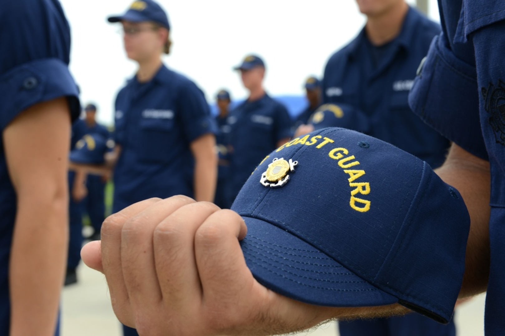 Company commanders present the senior recruit company with their Coast Guard Emblem at Coast Guard Training Center Cape May, N.J., July 29, 2013. The presentation of the Emblem signifies another step in the recruits' progress to earning the title "Coast Guardsman." (Coast Guard photo by Chief Warrant Officer Donnie Brzuska)