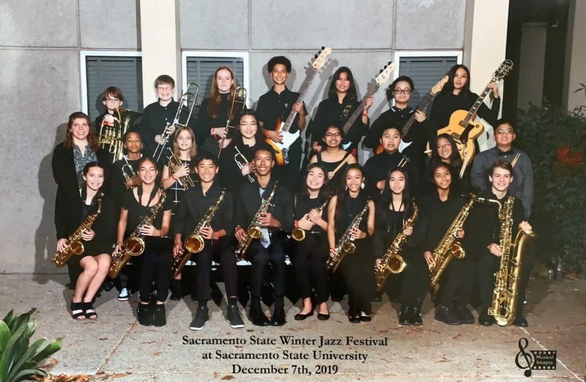 The author of this article, Sgt. Mahovsky, was a middle school band director before joining The U.S. Air Force Band. Here, she is pictured with her Jazz Band at a music festival hosted by Sacramento State University.