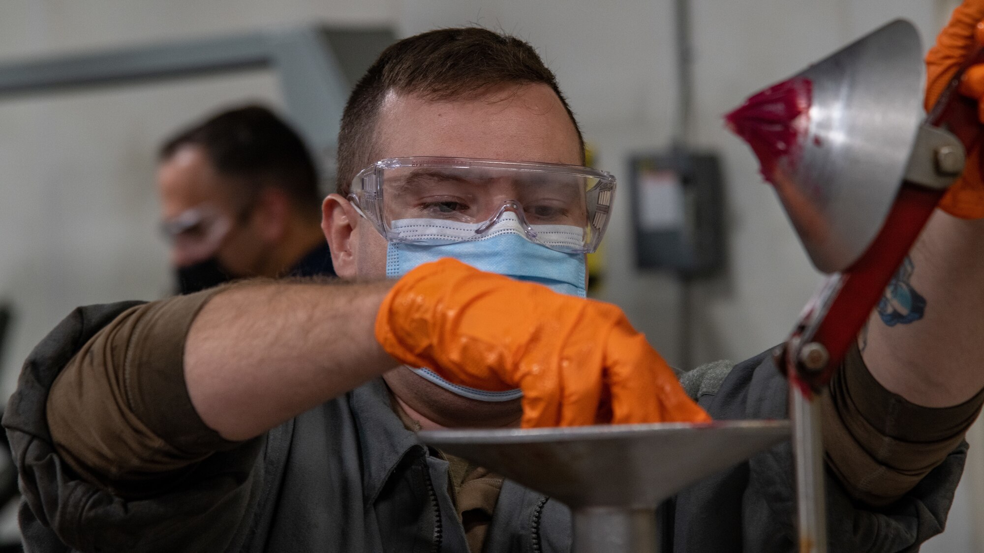 U.S. Air Force Senior Airman Justin Bergeron, 56th Equipment Maintenance Squadron wheel and tire journeyman, uses a wheel-bearing packer Oct. 14, 2021, at Luke Air Force Base, Arizona. In order to expedite the future use of wheel bearings, Airmen pre-inspect, clean and re-pack the bearings with grease to ensure the bearings are ready for use once needed. The wheel and tire shop provides essential and reliable aircraft parts for the F-35A Lightning II and F-16 Fighting Falcon, supporting the world’s greatest fighter pilots and combat-ready Airmen. (U.S. Air Force photo by Staff Sgt. Collette Brooks)