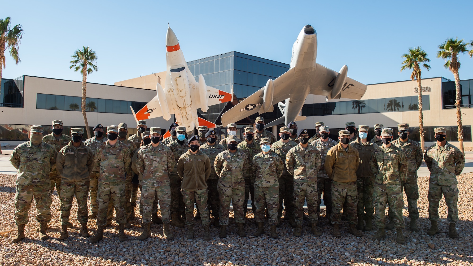 Team Edwards held its annual Community College of the Air Force and Recognition of Higher Degree ceremony in front of the 412th Test Wing headquarters building on Edwards Air Force Base, Oct. 14. (Air Force photo by Richard Gonzales)