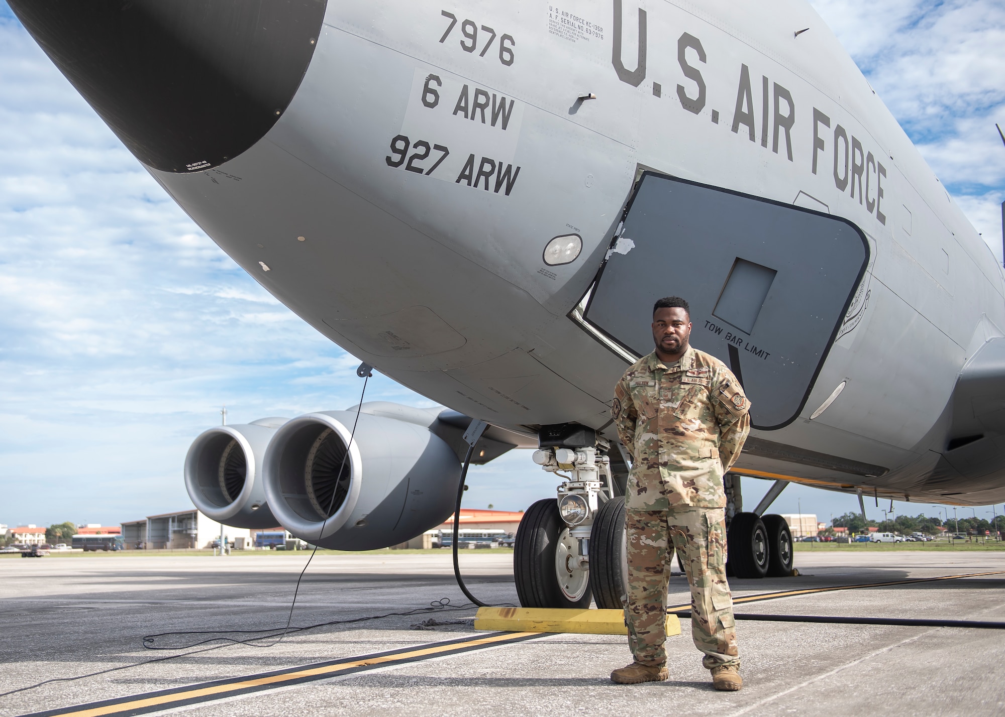 U.S. Air Force MSgt. Michael Fulton, 50th Air Refueling Squadron superintendent, pauses for a photo in front of a KC-135 Stratotanker aircraft on the flight line Oct. 6, 2021, at MacDill Air Force Base, Florida.