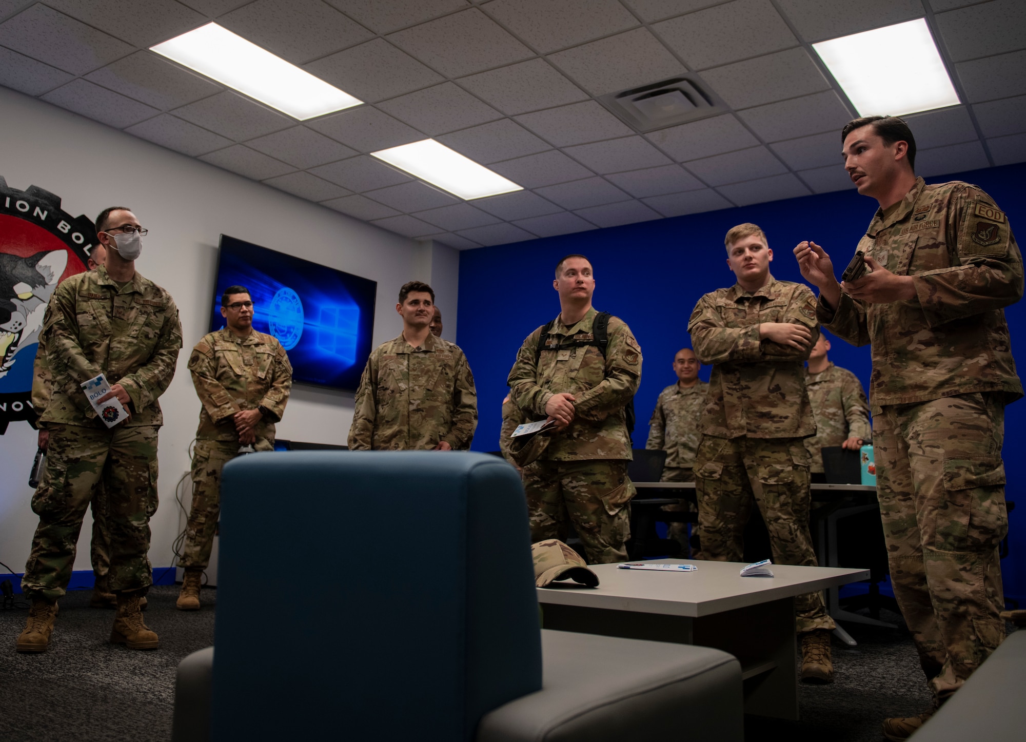 Staff Sgt. Benjamin Leonard, 8th Civil Engineer Squadron explosive ordnance disposal technician, briefs Airmen about the Android Tactical Awareness Kit during an Operation Be On the Lookout for Opportunity (BOLO) Open House at Kunsan Air Base, Republic of Korea, Oct. 13, 2021. Leonard spoke about the capabilities of the ATAK, which was one of many innovative ideas that were funded from previous “Wolf Tanks,” the base’s localized innovation board. (U.S. Air Force photo by Senior Airman Suzie Plotnikov)