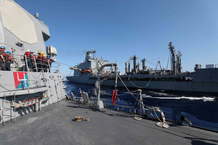 Sailors assigned to the Arleigh Burke-class guided-missile destroyer USS Porter (DDG 78) conduct replenishment-at-sea operations with the Henry J. Kaiser-class fleet replenishment oiler USNS Kanawha (T-AO-196), Oct. 17, 2021. Porter, forward-deployed to Rota, Spain, is on its 10th Patrol in the U.S. Sixth Fleet area of operations in support of U.S. national security interests in Europe and Africa.