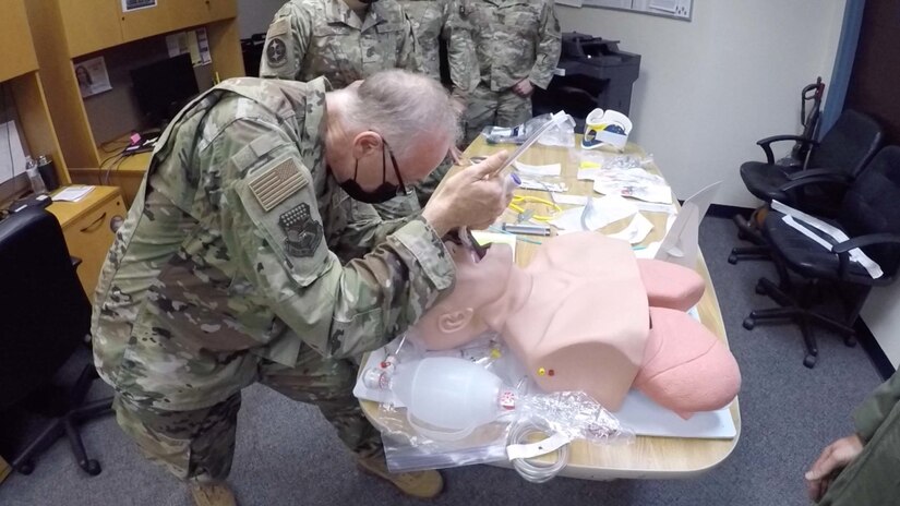 U.S. Air National Guard Maj. Sammar Atassi, an internal medicine physician assigned to the 130th Medical Group headquartered at  McLaughlin Air National Guard Base, in Charleston, West Virginia, intubates an infant training mannequin during the Advanced Trauma Life Support course at Biddle Air National Guard Base in Horsham, Pennsylvania, Sept. 28, 2021. Sixteen service members from nine different ANG units in six states participated in this ATLS class, which was hosted by the 111th Medical Group here. (U.S. Air National Guard photo by Tech. Sgt. Tyrone G. Mitchell)