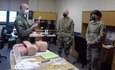 U.S. Air Force Col. Adam Colombo, 111th Medical Group Commander, instructs members participating in the Advance Trauma Life Support Course held at Biddle Air National Guard Base in Horsham, Pennsylvania, September 28, 2021. This is the second time the 111th MDG has hosted ATLS, which was developed by the American College of Surgeons and first introduced in the U.S. and abroad in 1980. (U.S. Air National Guard photo by Tech. Sgt. Tyrone G. Mitchell)